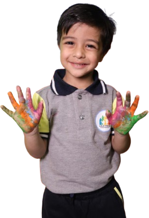 Student of Crayons Montessori Play School Kanke Road Ranchi with colored Hands, Kids love colors and painting