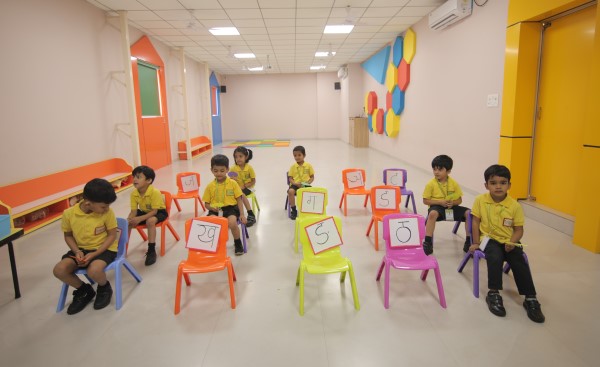 Children learning phonics and early reading skills at Crayons Montessori Play School Ranchi