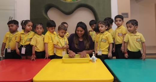Kids and Teacher doing fun activity at Crayons Montessori Play School, the best Play School in Ranchi | Kanke Road | Day Care