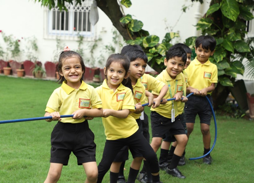 Huge lush green Lawn for Kids play at Crayons Montessori Play School, the best Play School in Ranchi | Kanke Road | Day Care
